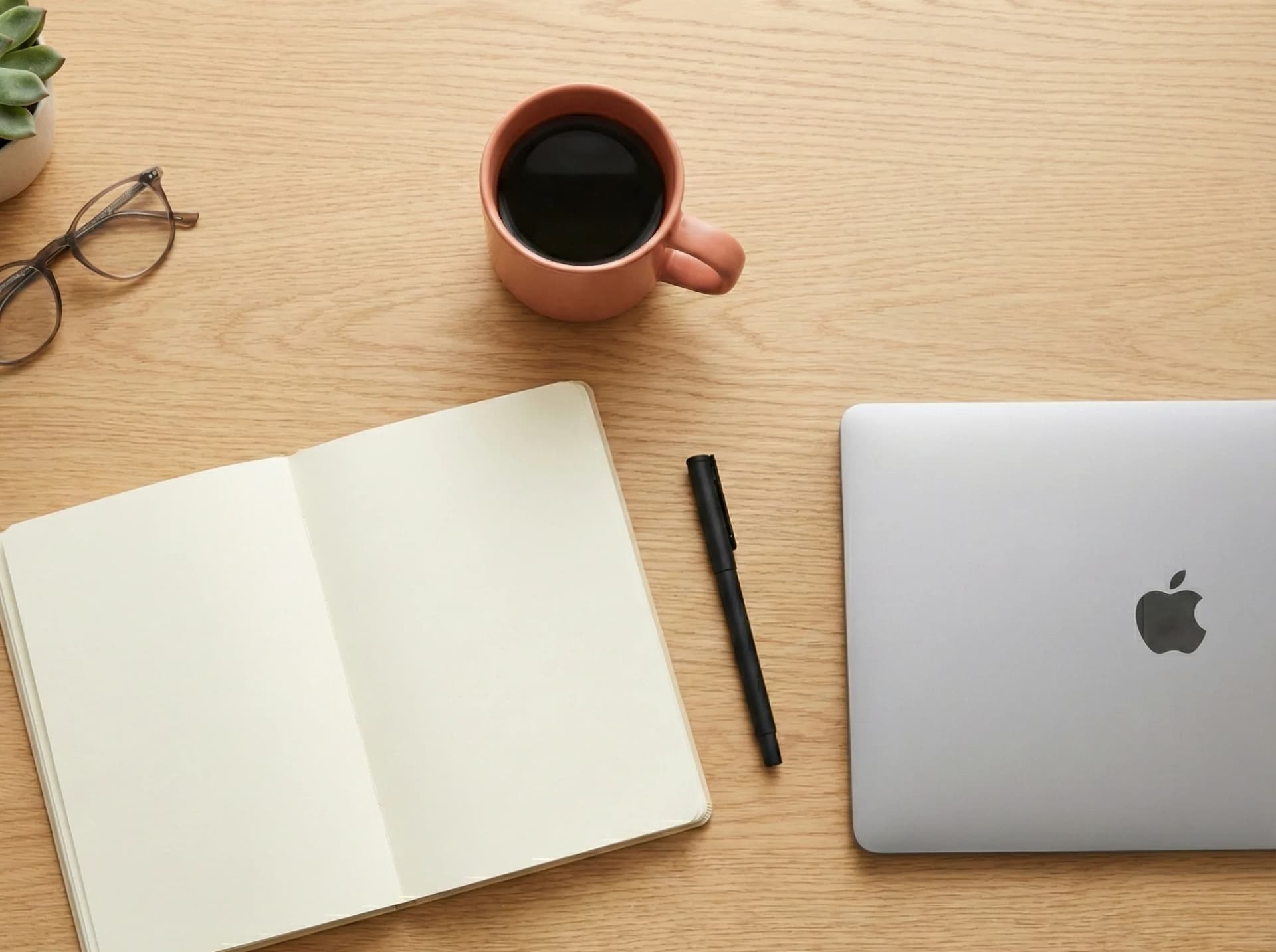 Business owner focused at desk workspace while Connascent handles website maintenance